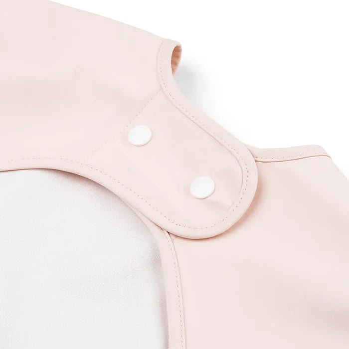 Babero grande con mangas y bolsillo Playground rosa 6-18 meses