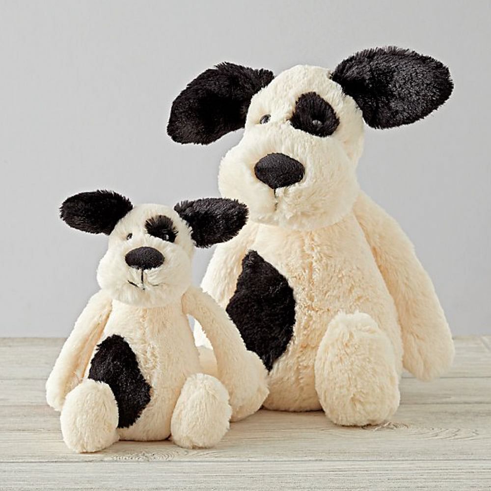 Peluche perro 2025 blanco y negro